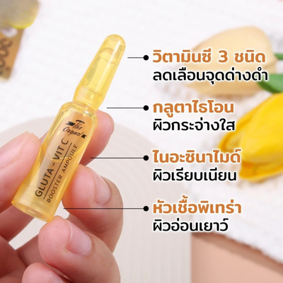 Applying Gluta-Vit C Booster on face