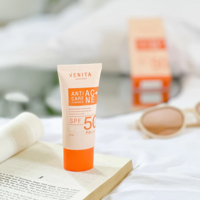Applying Venita SPF50 sunscreen on face
