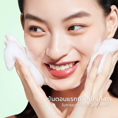 A Woman washing her face with Skintific Acne Cleanser