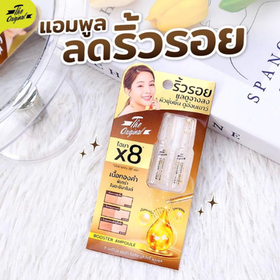 Applying gold serum from The Original Anti-Wrinkle Ampoule