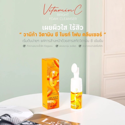 Applying Vanekaa Vitamin C bright foam cleanser on face